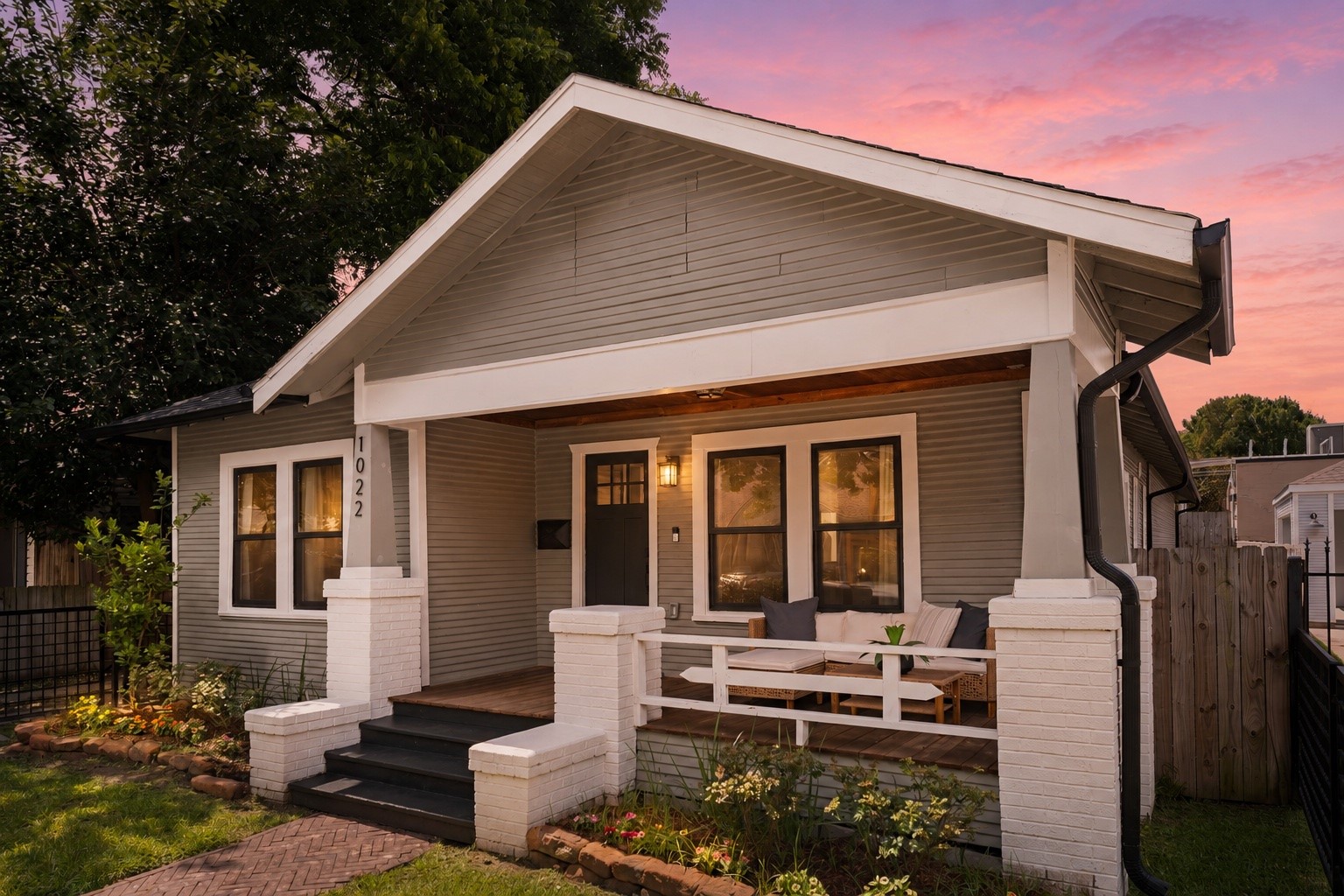 Welcome to 1022 Key Street! Nestled on a picturesque, tree-lined street in the heart of Norhill Heights, this stunningly reimagined 1930s bungalow balances vintage charm with the sleek, high-end comforts of modern living.