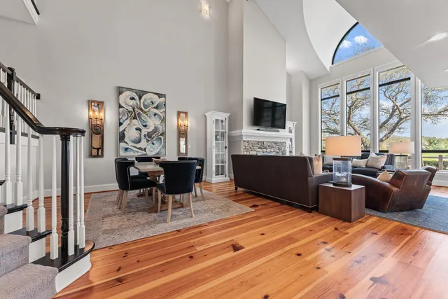a view of a dining room with furniture and window
