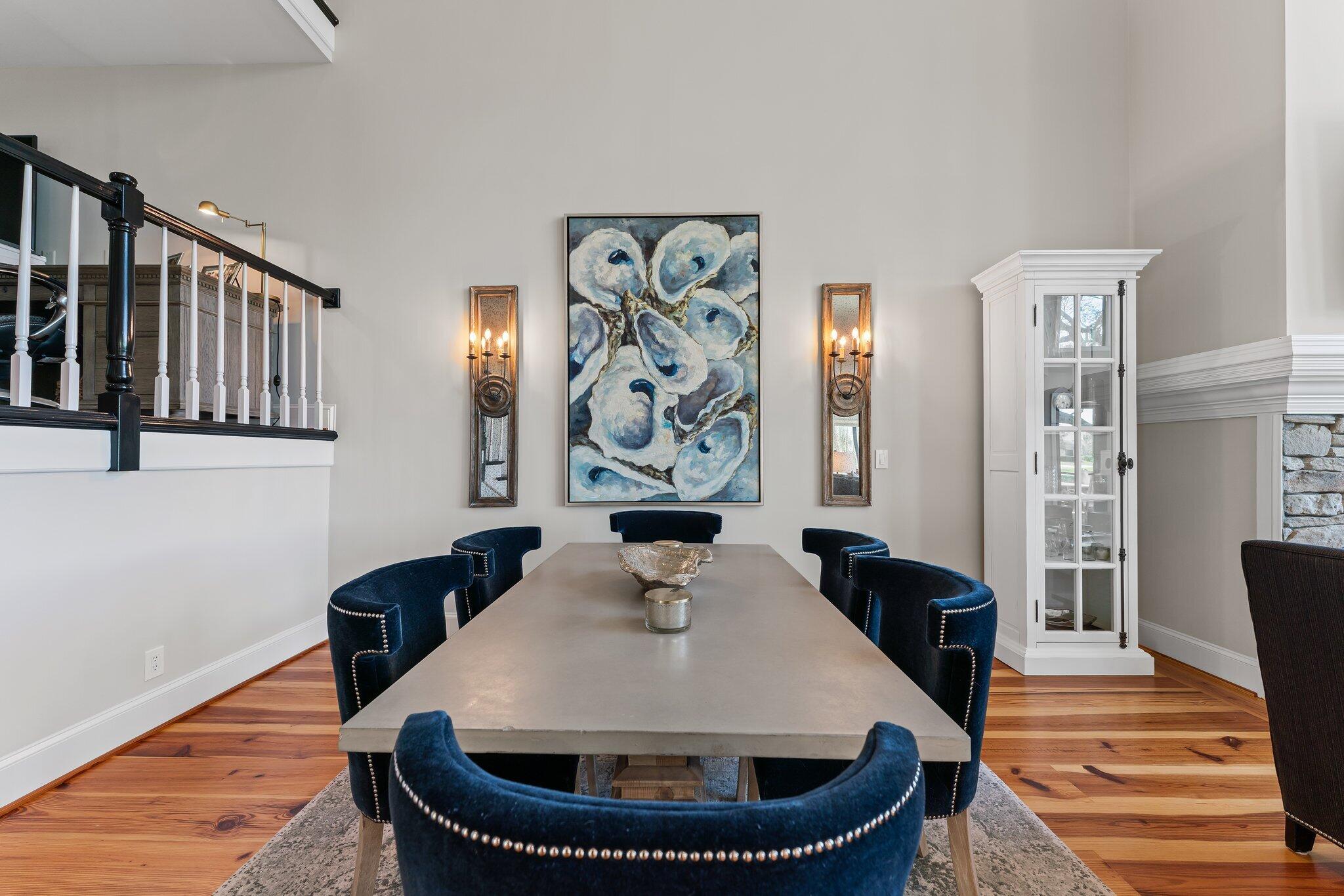 18760 Southeast Pineneedle Lane Jupiter, FL 33469 - Photo 15 of 58 a dining room with rug sinks wooden floor and a rug