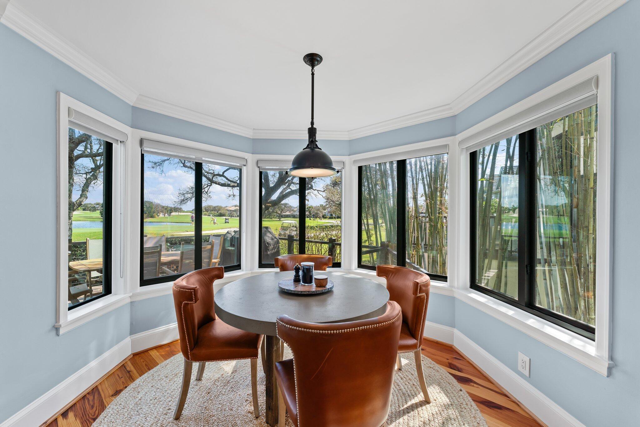 18760 Southeast Pineneedle Lane Jupiter, FL 33469 - Photo 25 of 58 a dining room with furniture window and outdoor space