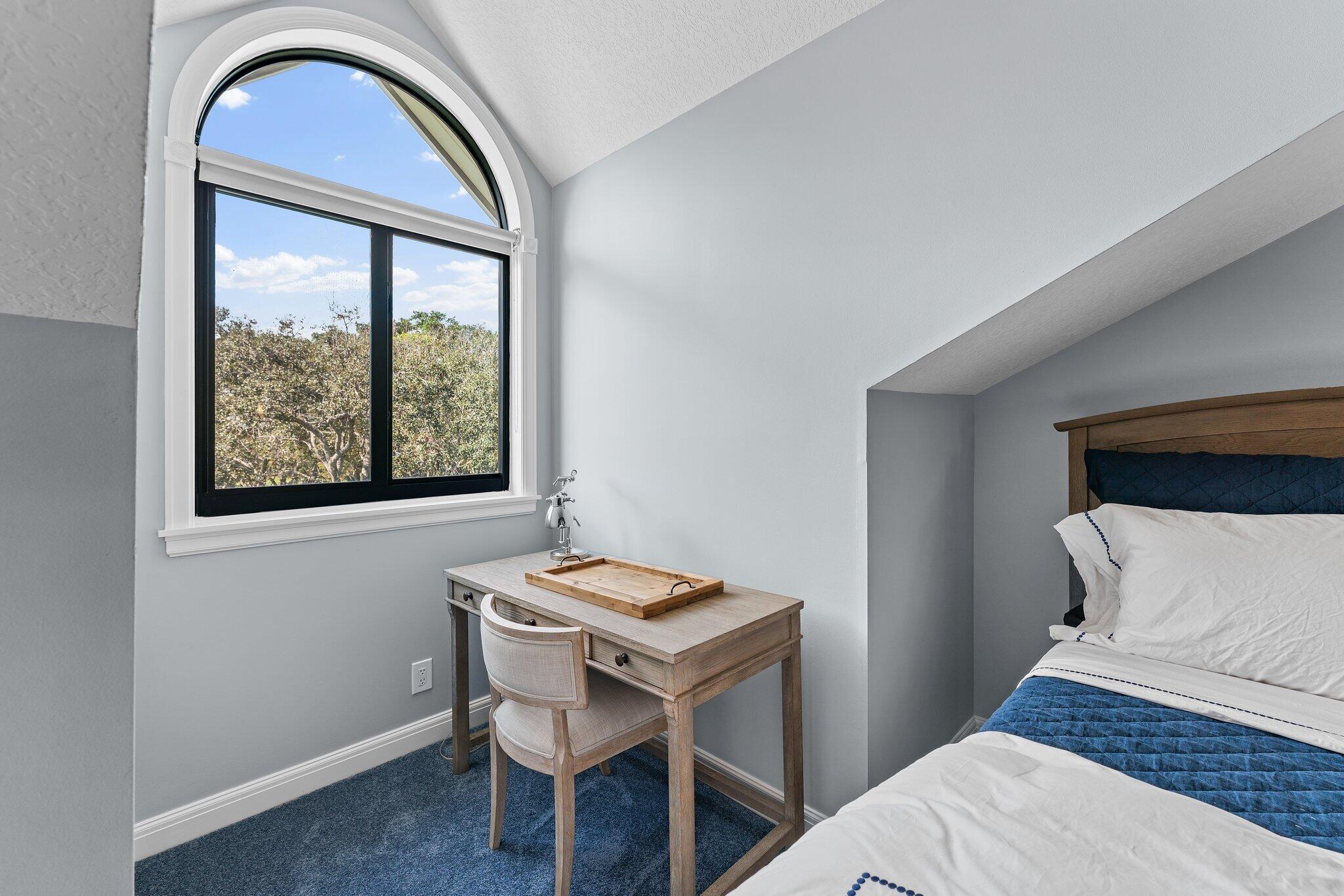 18760 Southeast Pineneedle Lane Jupiter, FL 33469 - Photo 41 of 58 a bedroom with a bed and a window