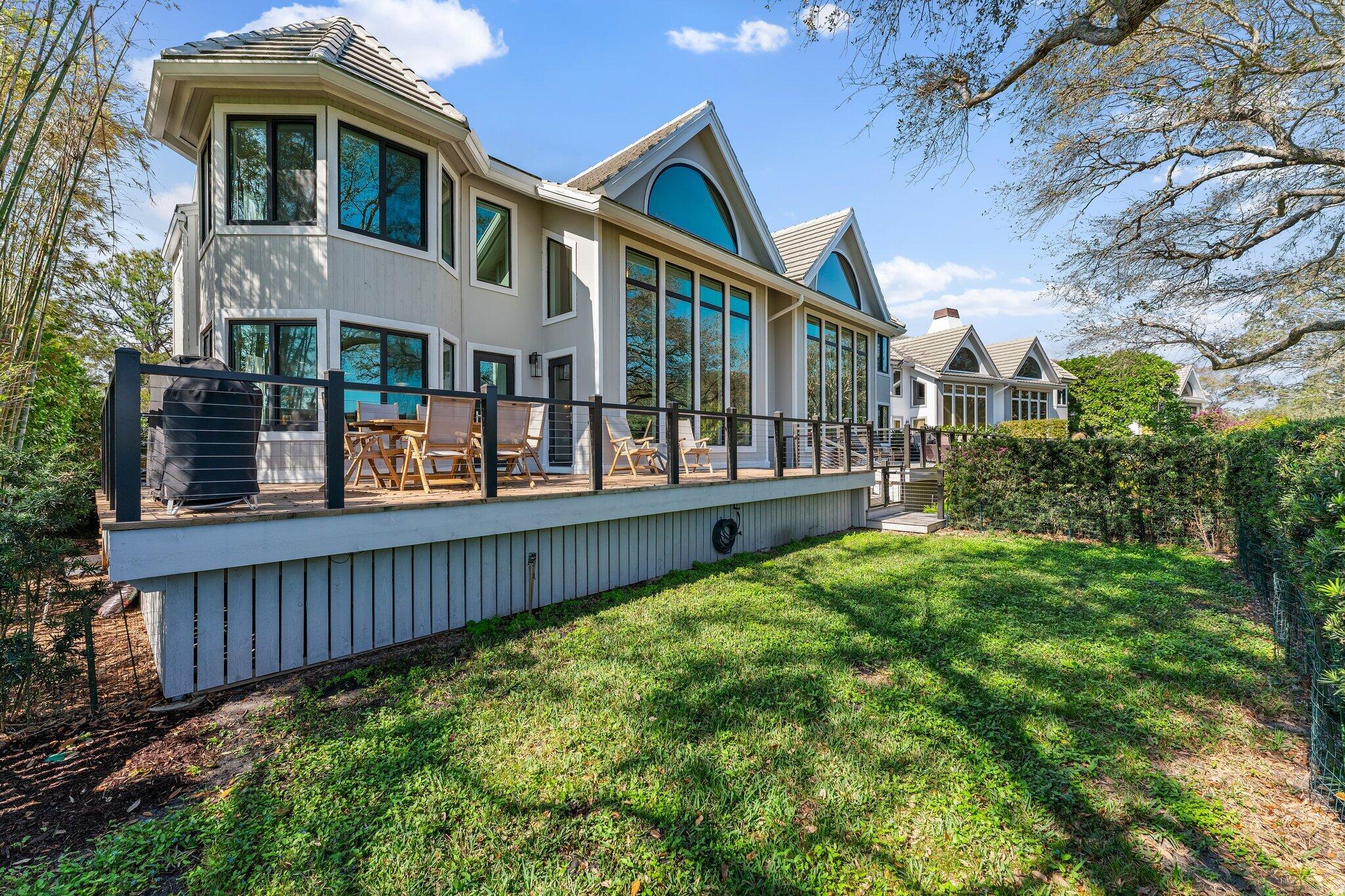 18760 Southeast Pineneedle Lane Jupiter, FL 33469 - Photo 51 of 58 a front view of a house with balcony