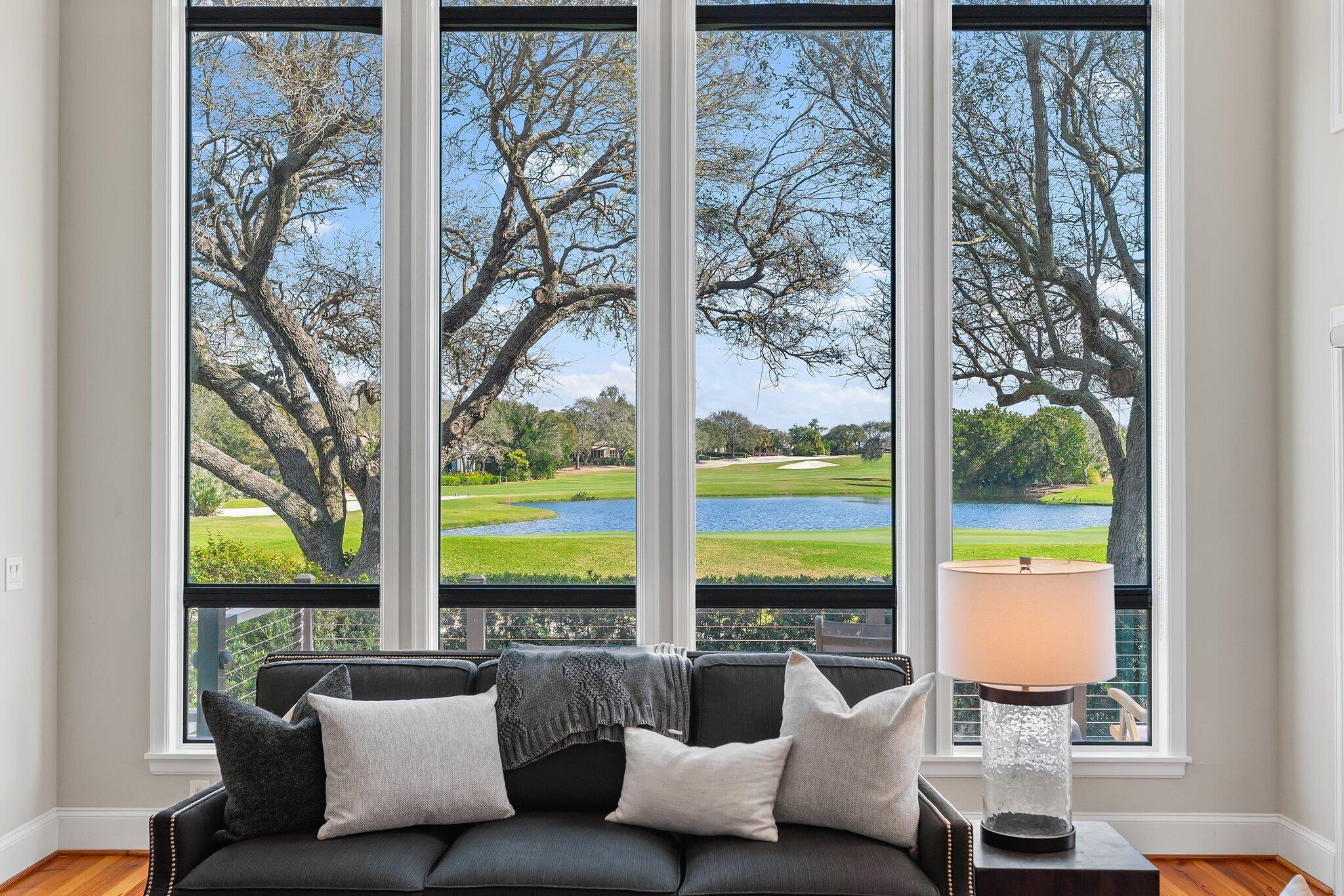 18760 Southeast Pineneedle Lane Jupiter, FL 33469 - Photo 9 of 58 a living room with furniture and a window