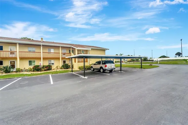 a view of a street with cars