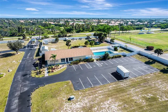 a view of a city with lawn chairs