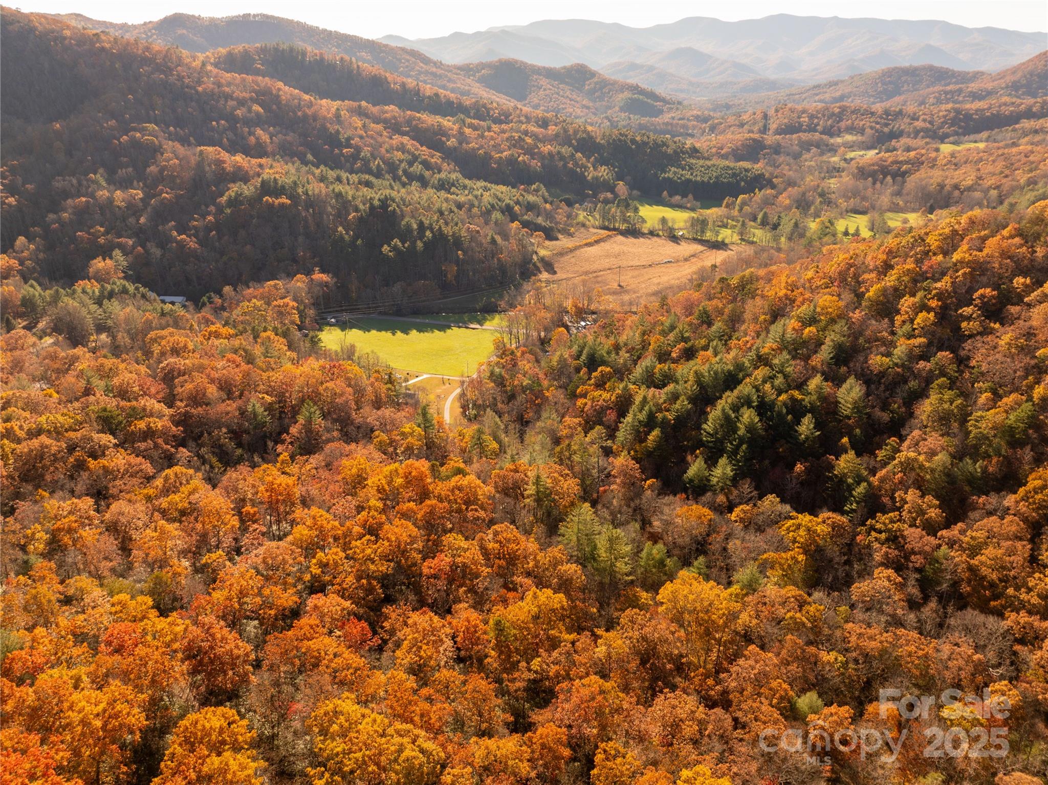 4444 Conley Rdg Trail Franklin, NC 28734 - Photo 14 of 16 a view of a mountain range in a cloudy sky