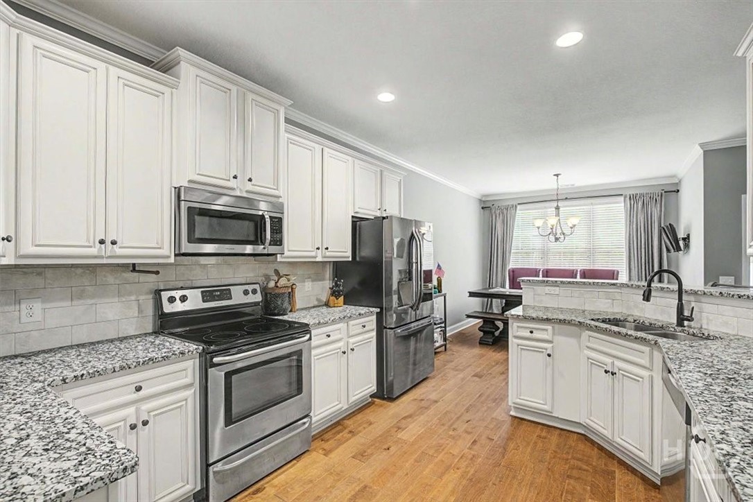 109 Red Oak Lane Rincon, GA 31326 - Photo 14 of 50 Bright white kitchen with plenty of storage