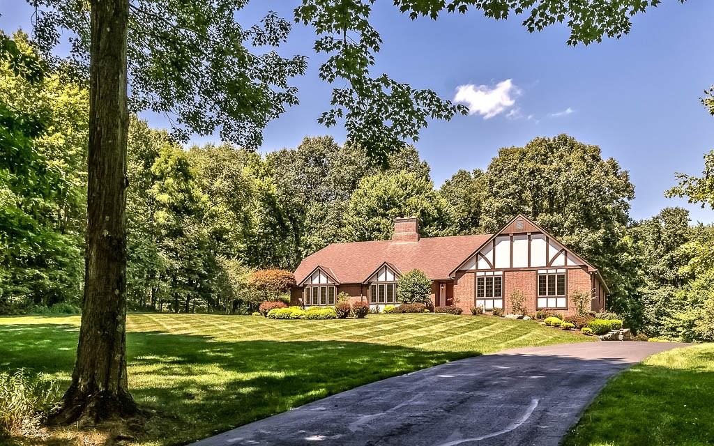 558 Callery Road Cranberry Township, PA 16066 - Photo 2 of 25 Behold your Private Retreat as you approach the home via the winding Tree-lined and Lamplit Drive