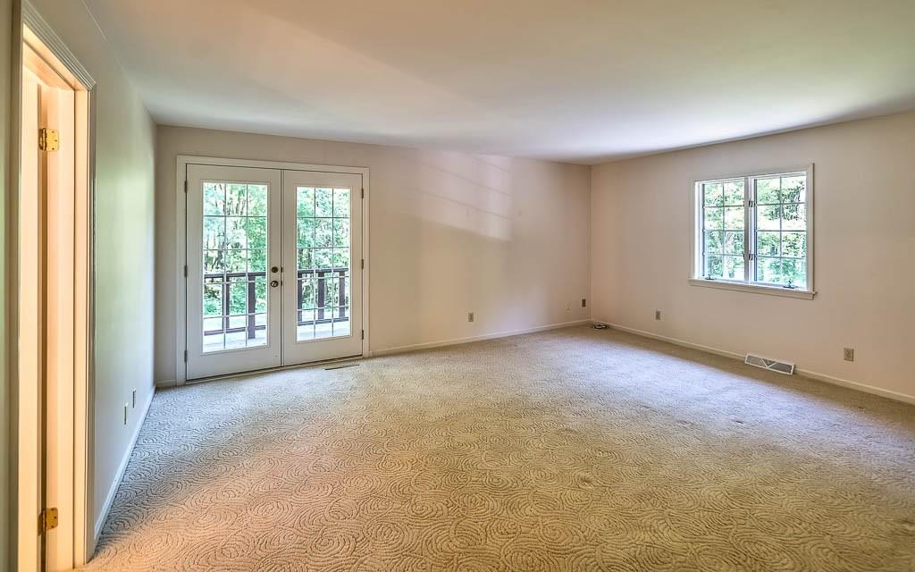 558 Callery Road Cranberry Township, PA 16066 - Photo 11 of 25 The Master Bedroom has French Doors to a Private Balcony with Serene Wooded Views.