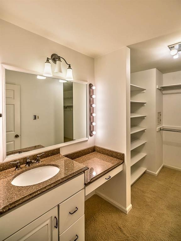 558 Callery Road Cranberry Township, PA 16066 - Photo 14 of 25 A Huge Walk-in Closet is located in the Master Bedroom Suite, complete with Sink and Make-up Vanity.