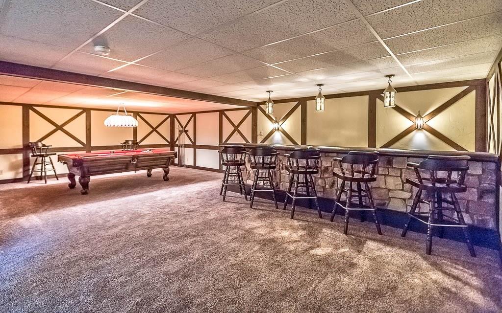 558 Callery Road Cranberry Township, PA 16066 - Photo 19 of 25 An Over-sized Bar in the Lower Level Gameroom affords great space for large get-togethers.