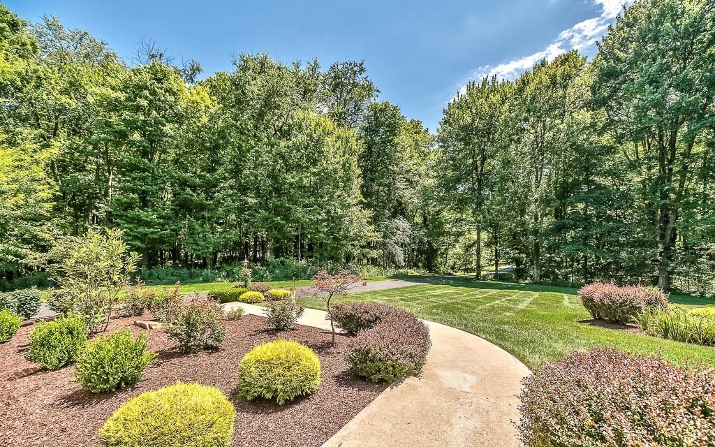 558 Callery Road Cranberry Township, PA 16066 - Photo 3 of 25 Beautiful Landscaping and Natural Wood Setting just outside your Front Door