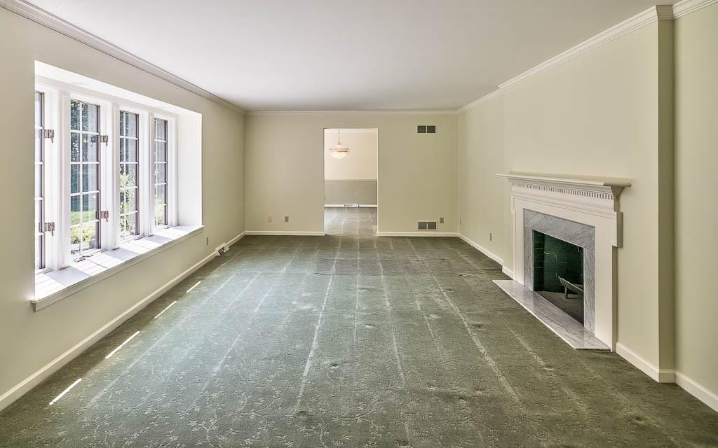 558 Callery Road Cranberry Township, PA 16066 - Photo 5 of 25 Plenty of Light streams into the Spacious Living Room through Bay Windows. A Wood Burning Fireplace provides a cozy retreat when the season turns.