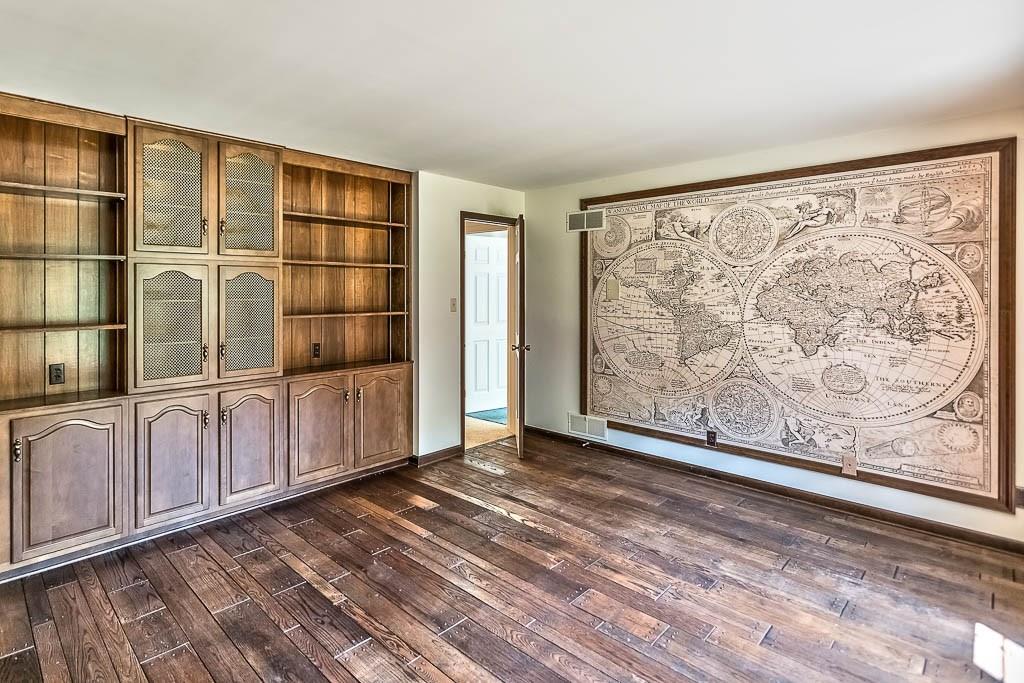 558 Callery Road Cranberry Township, PA 16066 - Photo 10 of 25 Built-in Cabinets and Shelving enhance the functionality of the Den.