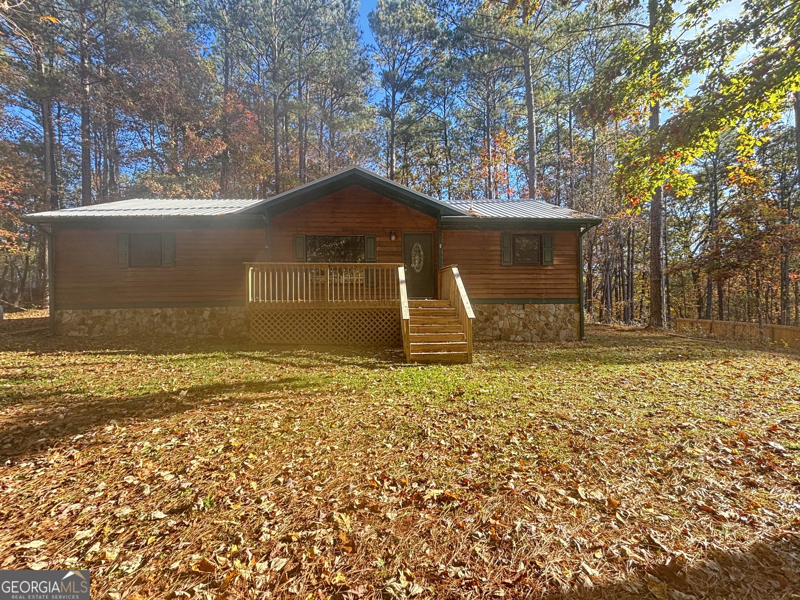 358 Whippoorwill Road Monticello, GA 31064 - Photo 1 of 20 a front view of a house with a yard