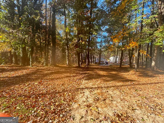 a view of road with trees