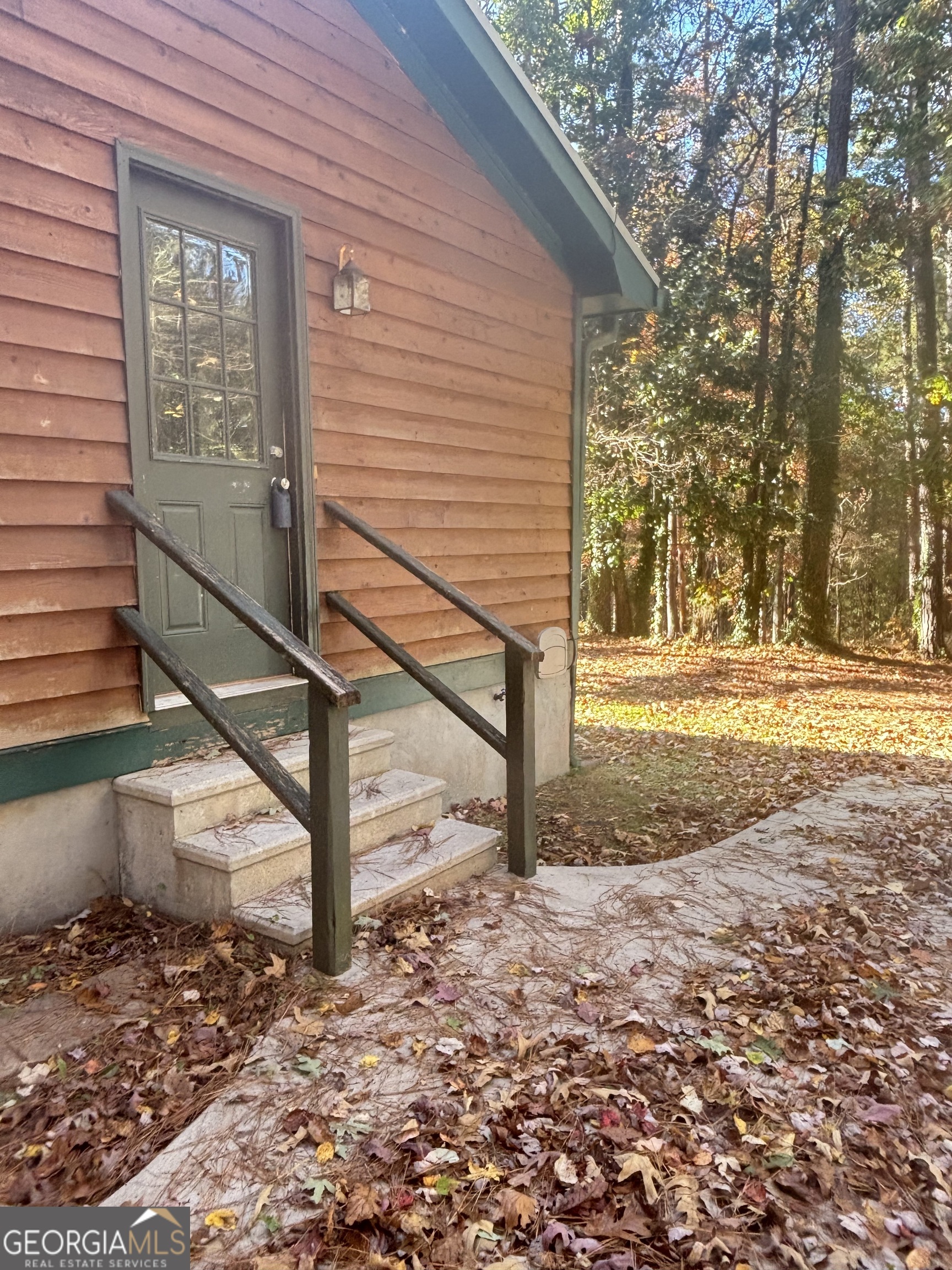 358 Whippoorwill Road Monticello, GA 31064 - Photo 4 of 20 a view of a house with backyard and trees
