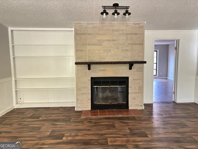 a living room with a fireplace