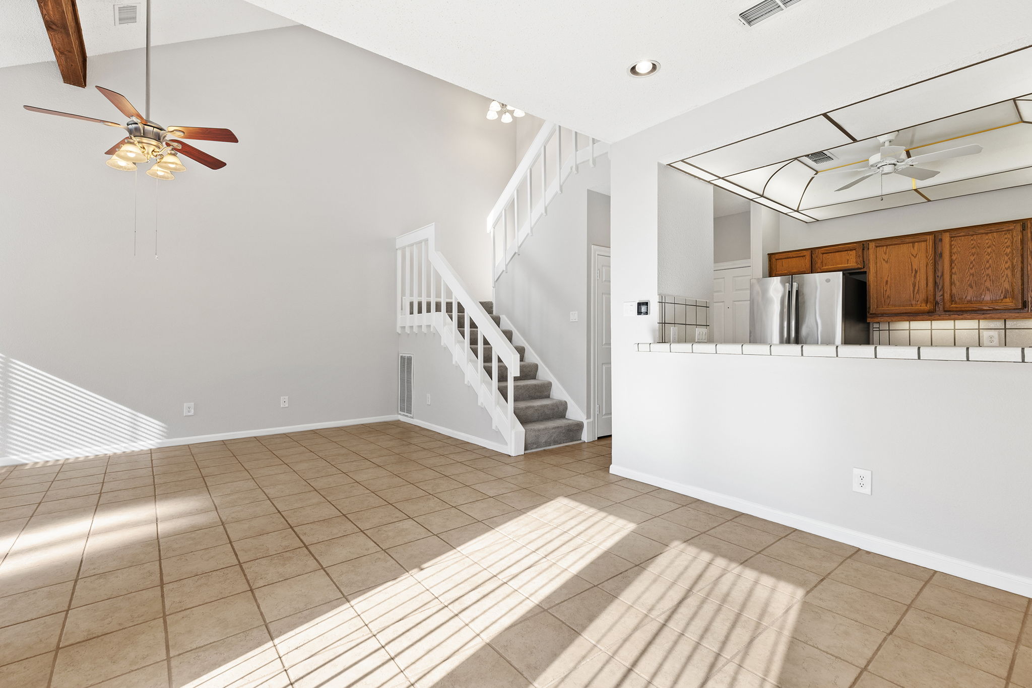 10819 Crown Colony Drive, Unit 11 Austin, TX 78747 - Photo 11 of 40 What makes this layout truly work is the way the living and dining areas flow together without losing their individual identity.