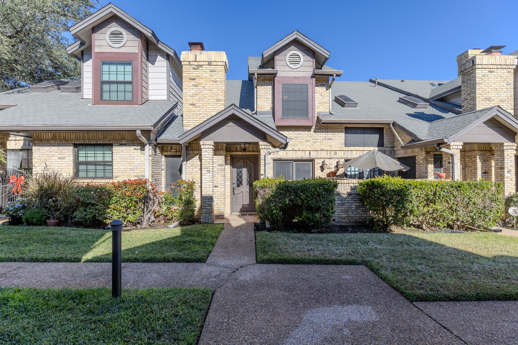 10819 Crown Colony Drive, Unit 11 Austin, TX 78747 - Photo 2 of 40 Onion Creek is kind of neighborhood where mornings feel quieter, evenings feel slower, and coming home actually feels like arriving somewhere, not just parking.