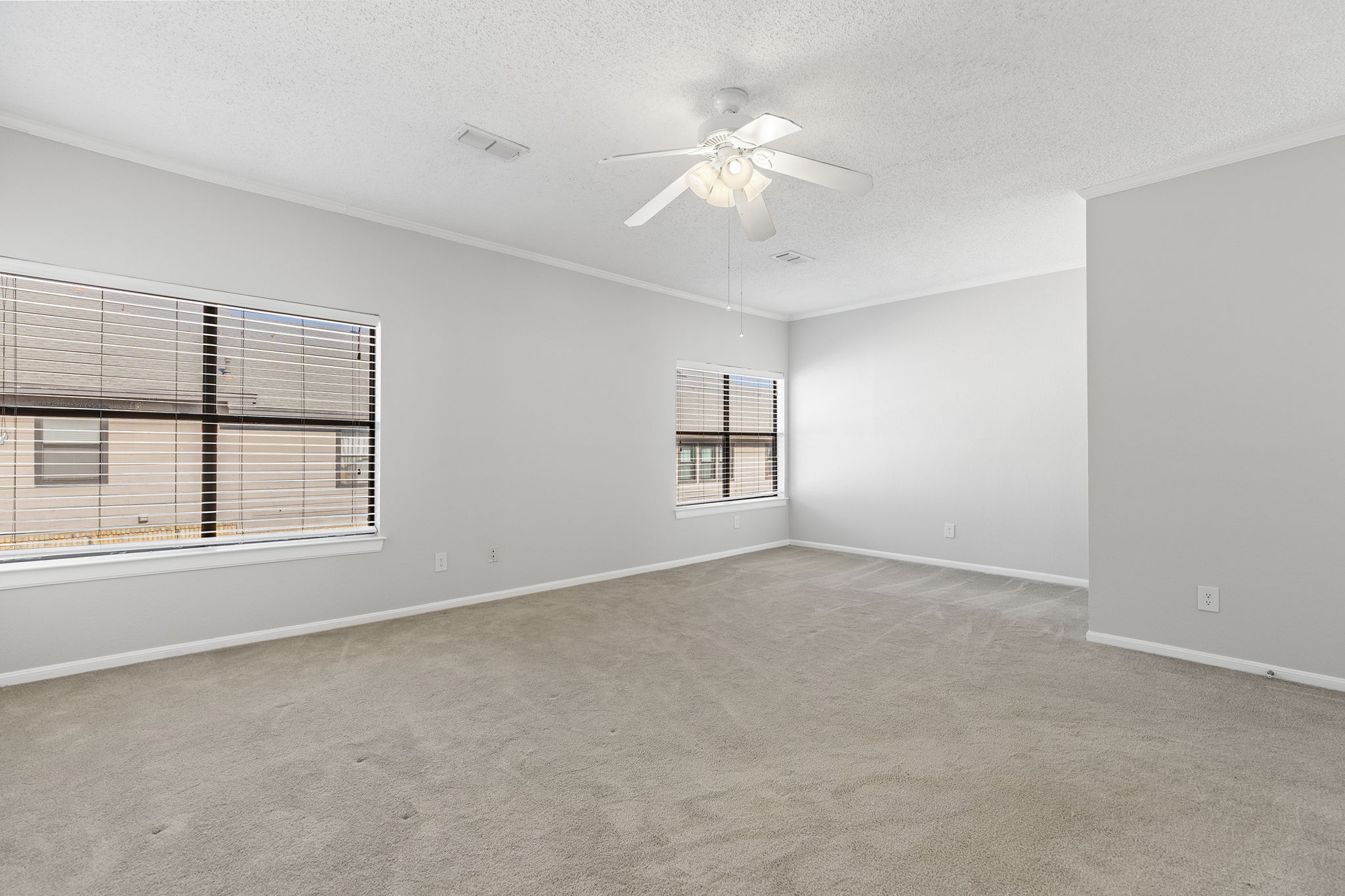 10819 Crown Colony Drive, Unit 11 Austin, TX 78747 - Photo 22 of 40 The layout offers both openness and privacy, with thoughtful separation from the rest of the home.