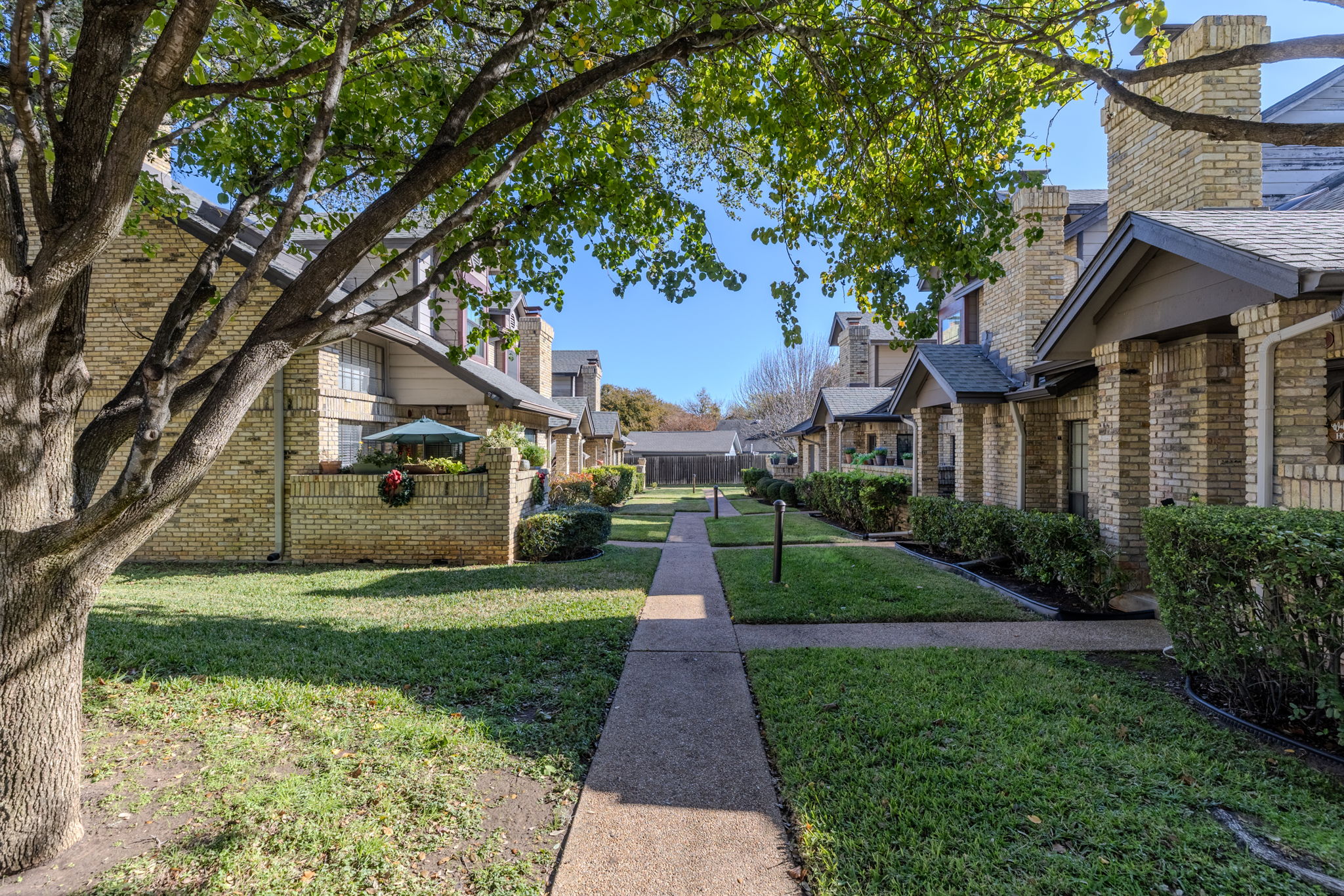10819 Crown Colony Drive, Unit 11 Austin, TX 78747 - Photo 30 of 40 Optional country club amenities offer golf, social gatherings, and a place to unwind, while open green areas and nearby trails create room for movement and quiet moments alike.