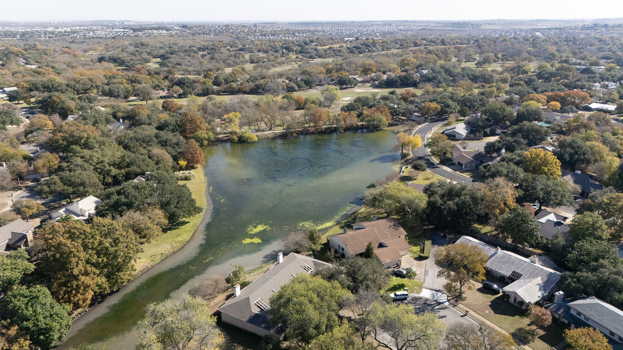 10819 Crown Colony Drive, Unit 11 Austin, TX 78747 - Photo 36 of 40 Living here means being surrounded by some of South Austin’s most established and naturally beautiful spaces.