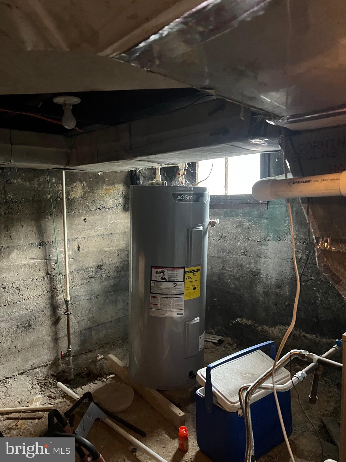 449 Baltimore Avenue Cumberland, MD 21502 - Photo 22 of 22 a room with water heater and a wooden door