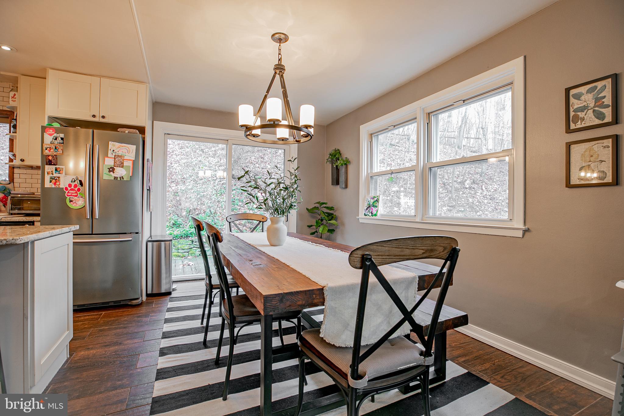 611 Brookwood Road Wayne, PA 19087 - Photo 11 of 41 a view of a dining room with furniture window and wooden floor