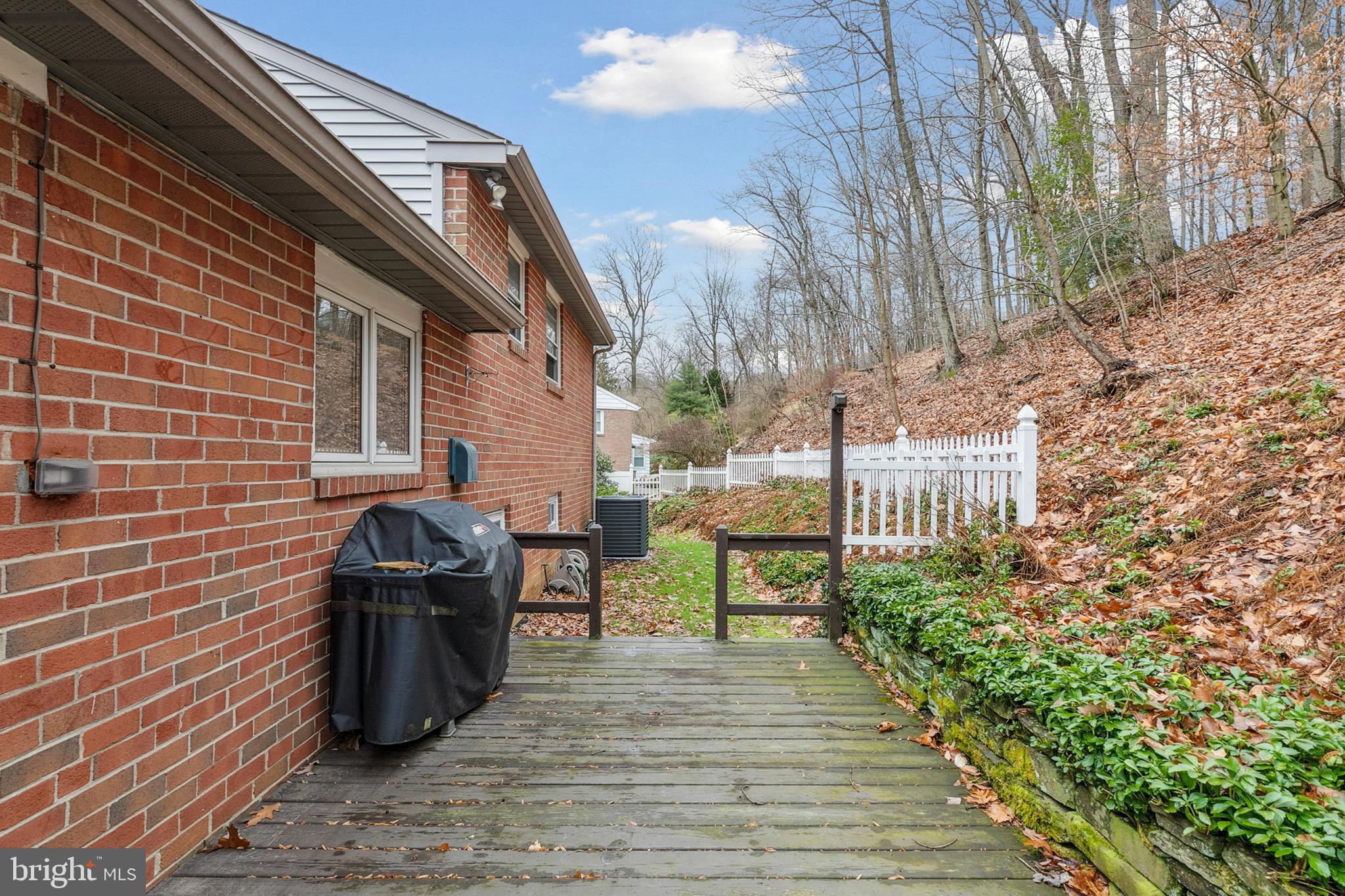 611 Brookwood Road Wayne, PA 19087 - Photo 14 of 41 a view of a patio with chairs and potted plants