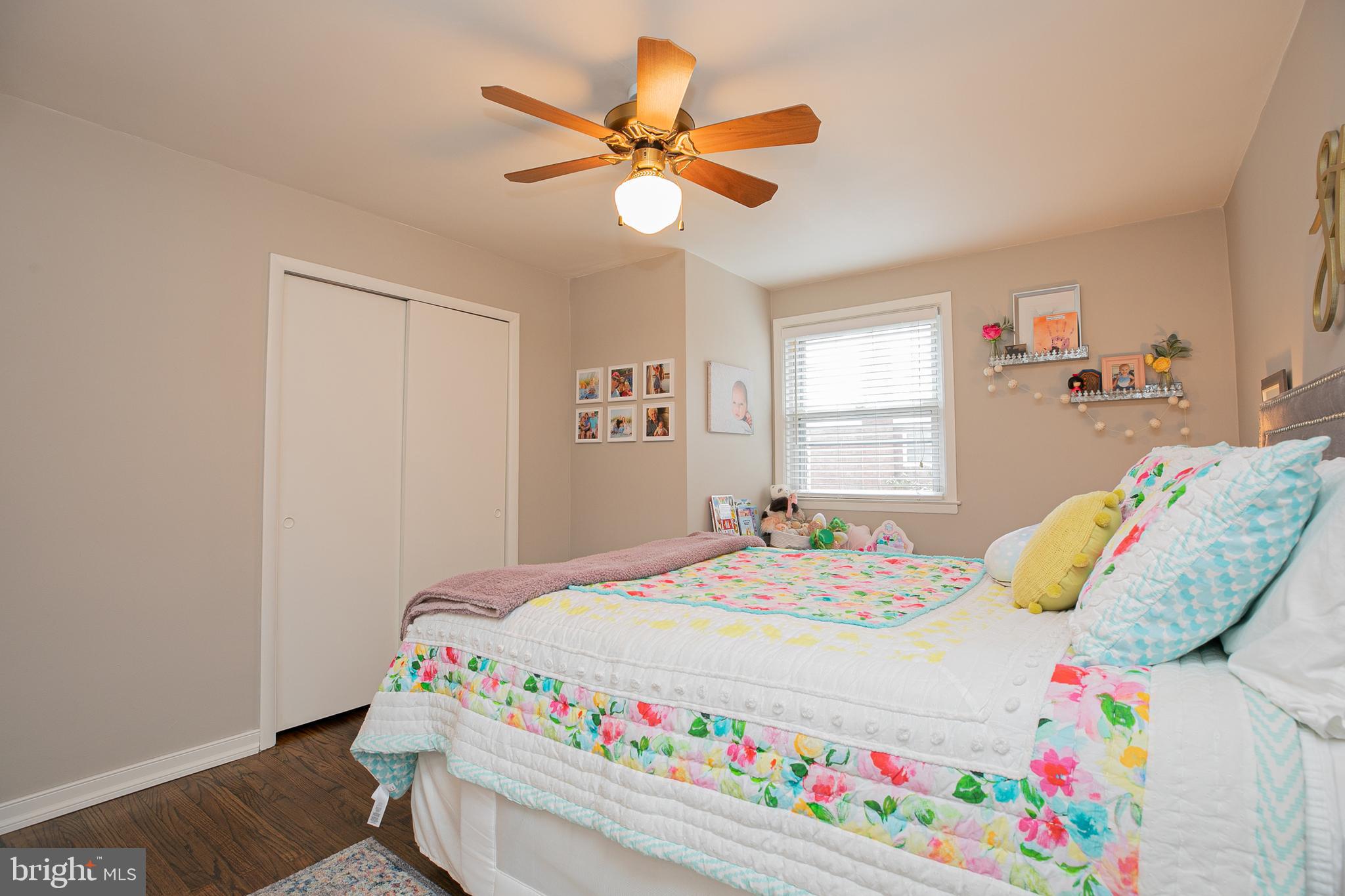 611 Brookwood Road Wayne, PA 19087 - Photo 21 of 41 a bedroom with a bed and a chandelier