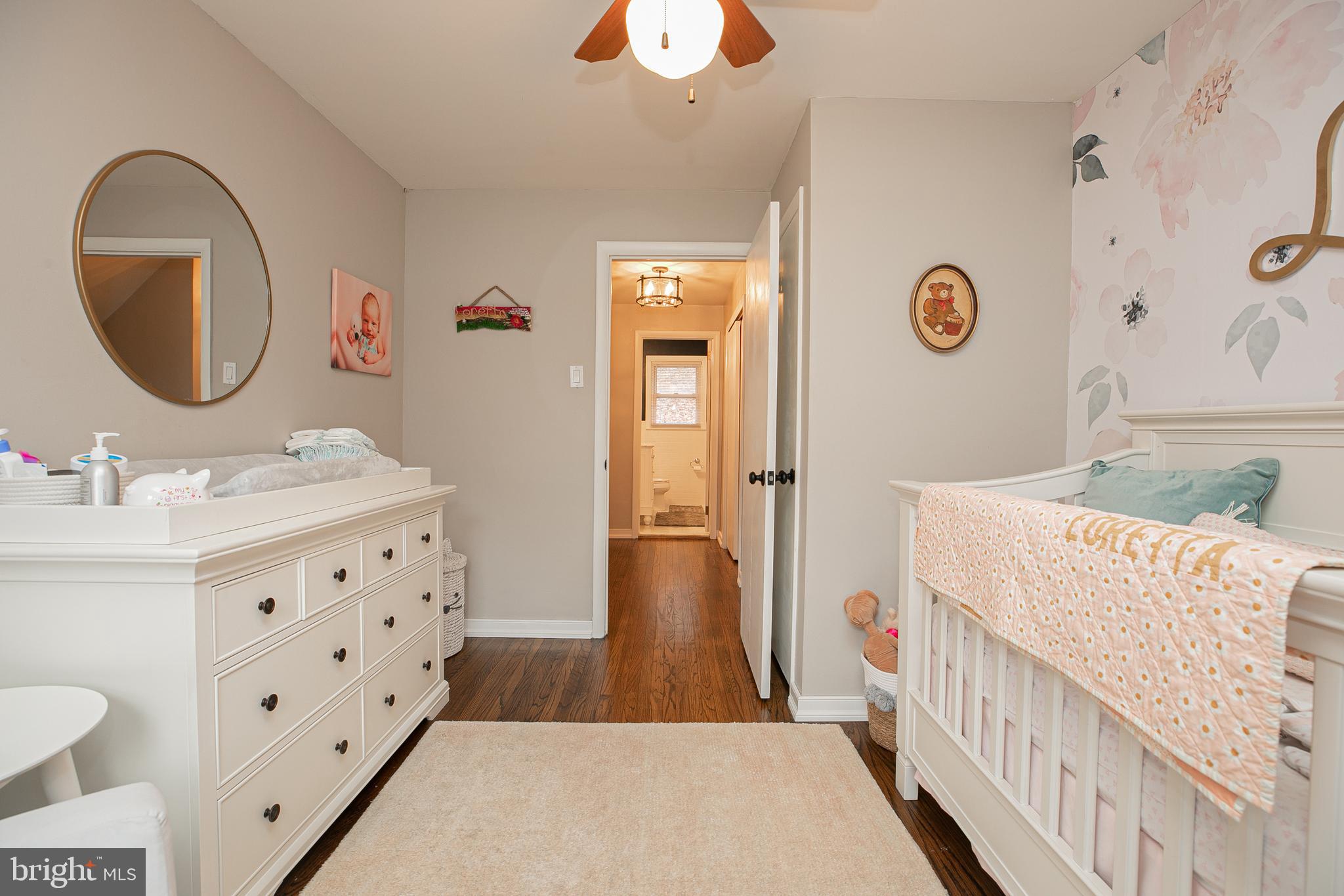 611 Brookwood Road Wayne, PA 19087 - Photo 23 of 41 a bathroom with a sink a mirror a vanity and a shower