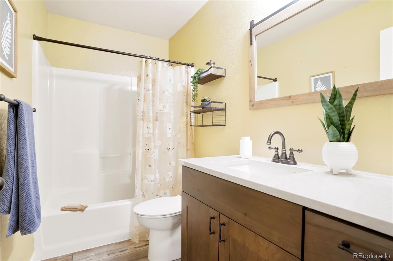 518 Draw Street Brighton, CO 80603 - Photo 18 of 35 a bathroom with a sink toilet and shower