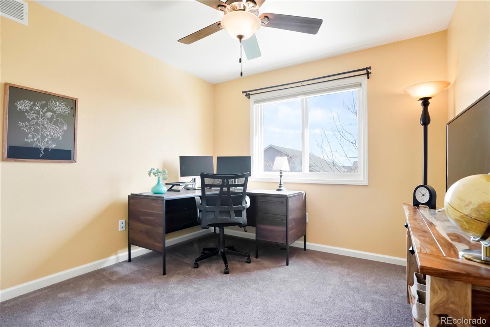 518 Draw Street Brighton, CO 80603 - Photo 19 of 35 a view of a workspace with furniture and a window