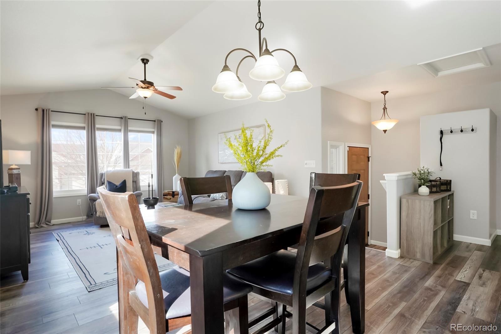 518 Draw Street Brighton, CO 80603 - Photo 7 of 35 a view of a dining room with furniture window and wooden floor