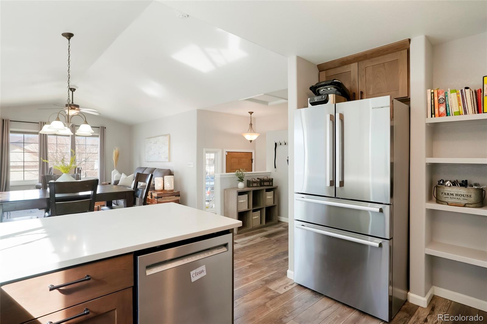518 Draw Street Brighton, CO 80603 - Photo 9 of 35 a kitchen with a refrigerator and a sink