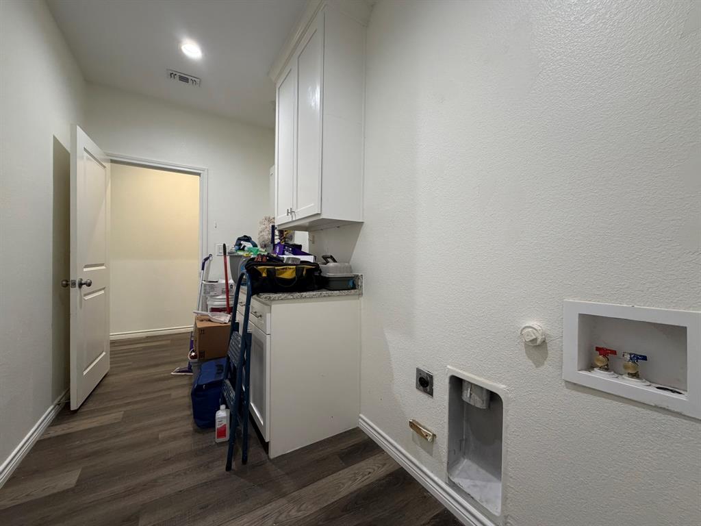 613 West Parnell Street Denison, TX 75020 - Photo 13 of 14 a view of workspace with wooden floor