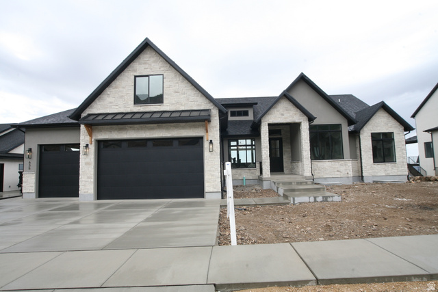 635 East Mountain Road North Ogden, UT 84414 - Photo 1 of 33 Modern architecture featuring a light stone facade and dark trim accents