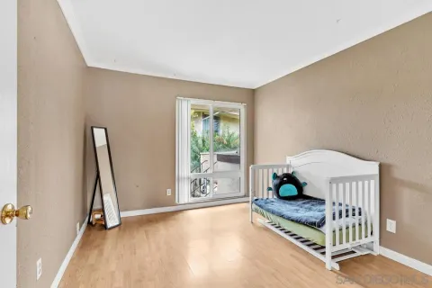 a view of hallway with wooden floor