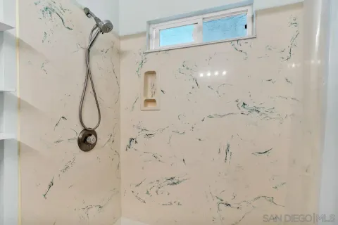 a car and bike parked in a garage