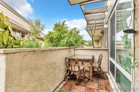 a view of kitchen with sink microwave and stove