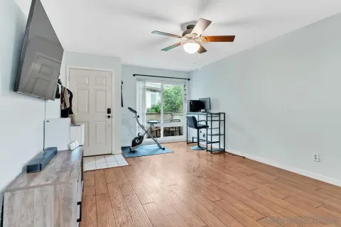 a kitchen with cabinets stainless steel appliances a sink and a stove