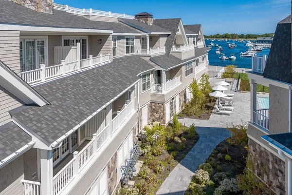 a aerial view of a house with a yard
