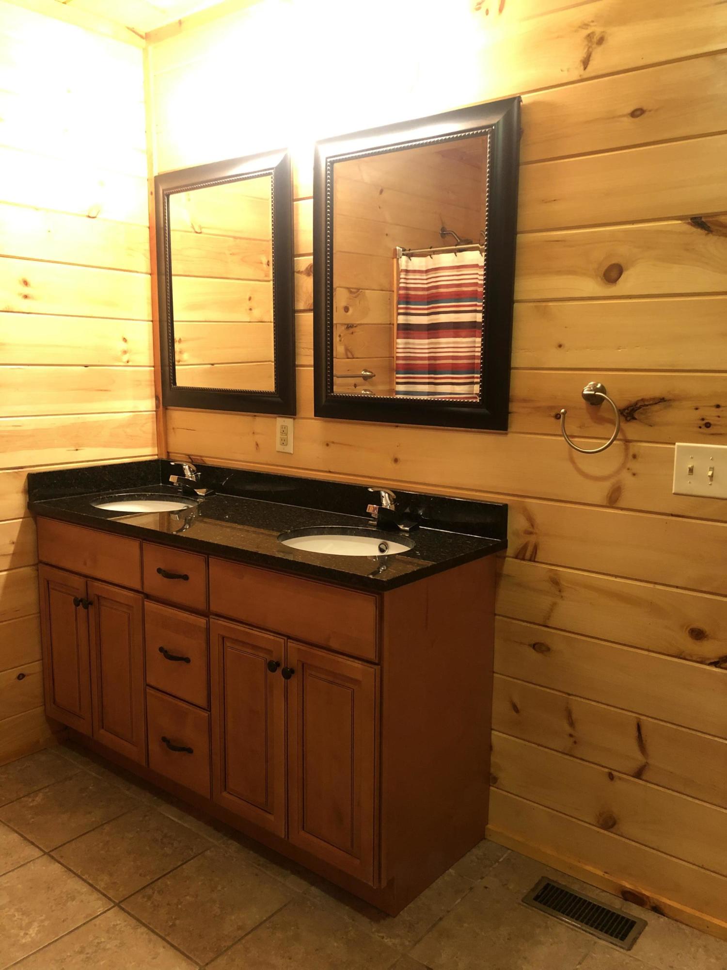 122 Jenkins Hollow Road Elizabethton, TN 37643 - Photo 14 of 35 In suite double granite vanity