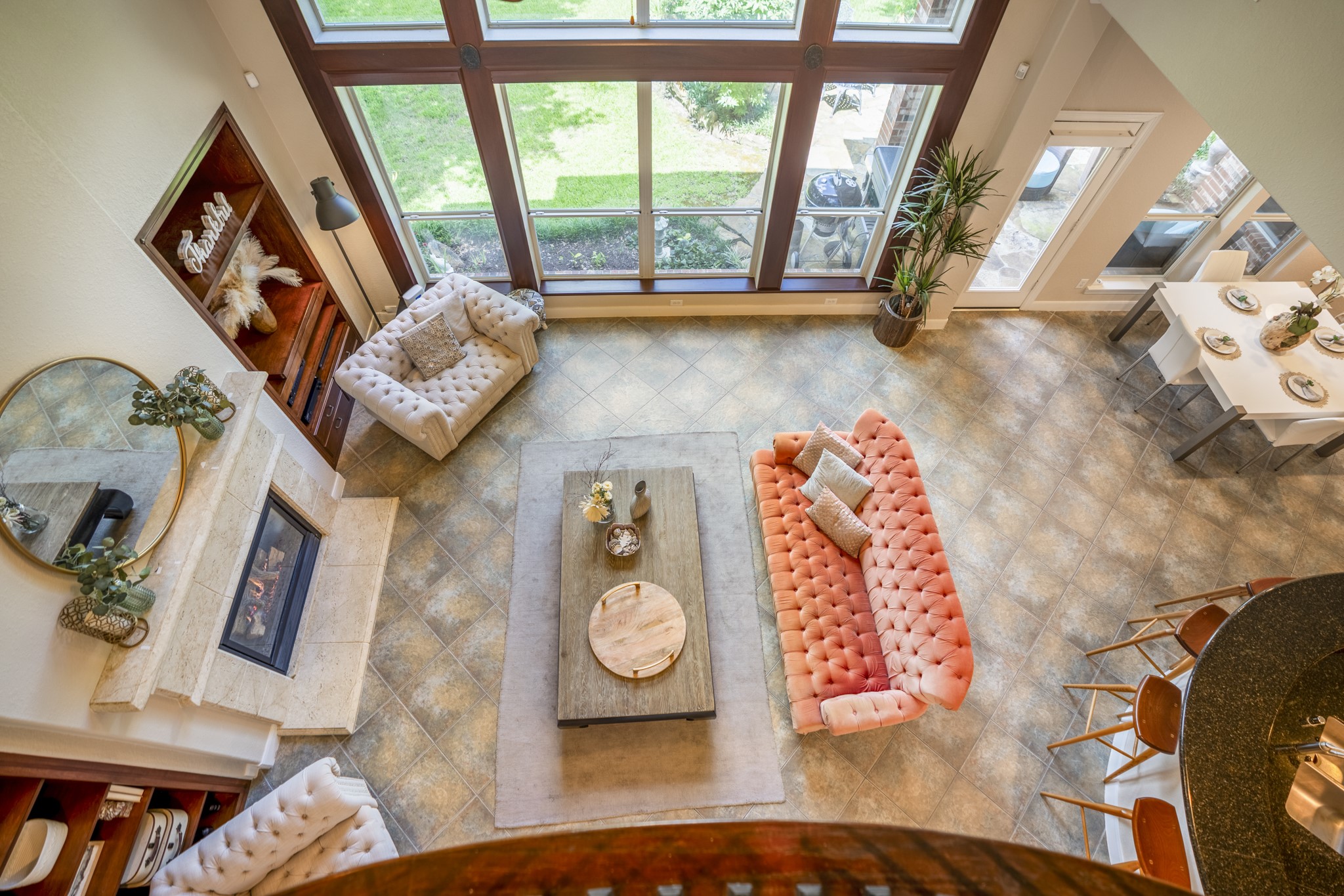 67 North Pentenwell Circle Spring, TX 77382 - Photo 23 of 50 a living room with couches and a large window with garden view