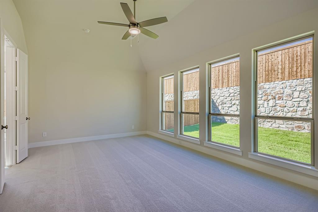 4203 Windy Point Court Oak Point, TX 75068 - Photo 12 of 29 wooden floor in an empty room with a window
