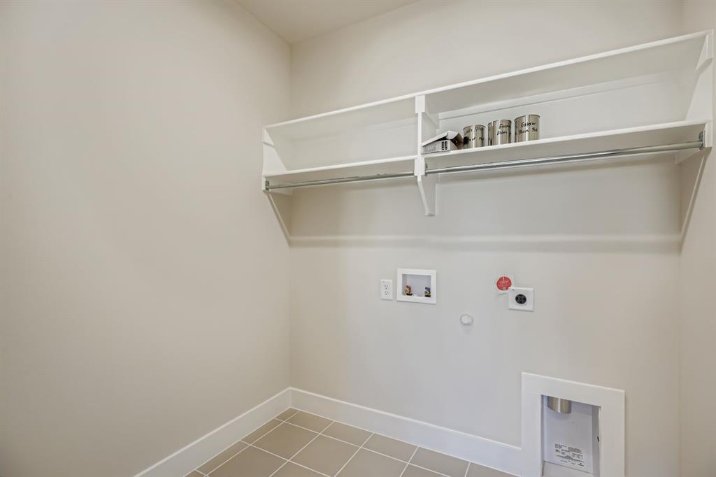 4203 Windy Point Court Oak Point, TX 75068 - Photo 24 of 29 a view of an empty walk in closet