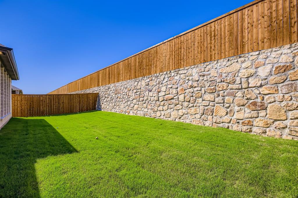 4203 Windy Point Court Oak Point, TX 75068 - Photo 27 of 29 a view of an outdoor space and a building