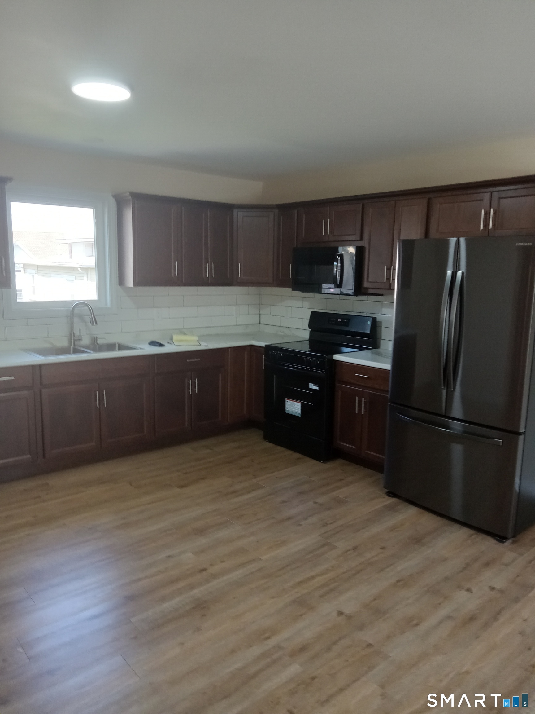 48 Prospect Street Meriden, CT 06451 - Photo 6 of 16 Kitchen/Dining Area