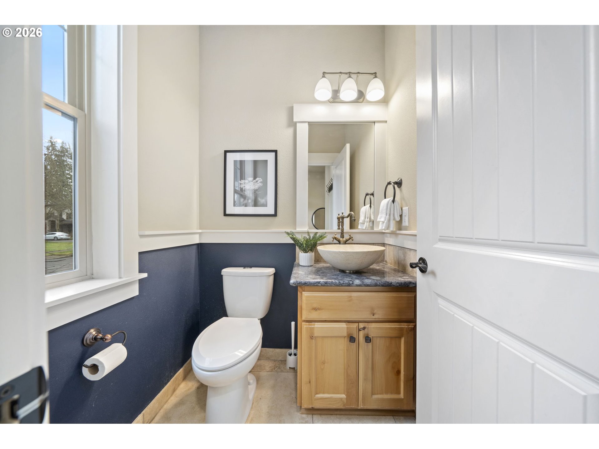 22421 Southwest Sequoia Terrace Sherwood, OR 97140 - Photo 22 of 48 a bathroom with a toilet a sink and mirror